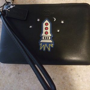 Coach nasa spaceship wrislet.